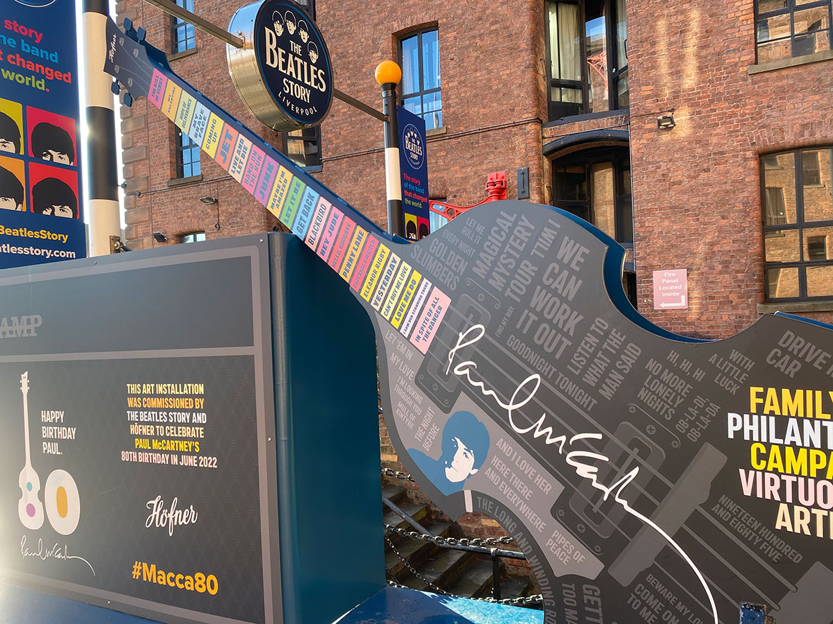 outside the Beatles museum liverpool with giant 3d guitar installation