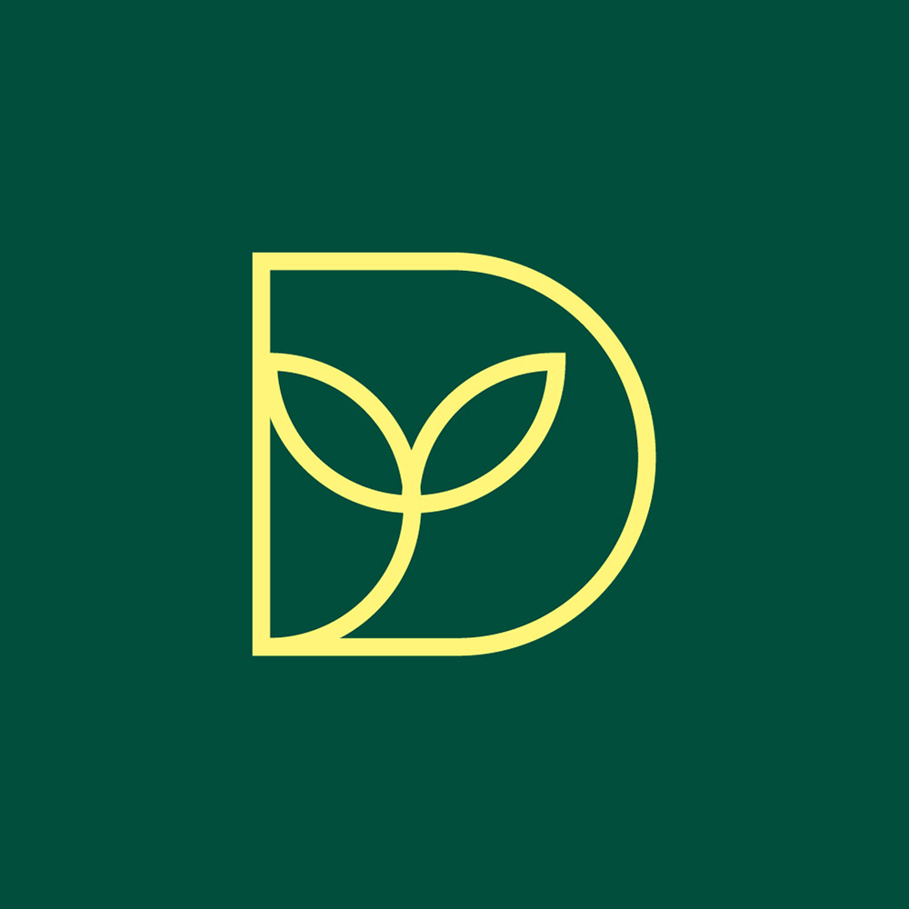 yellow geometric logo on green background